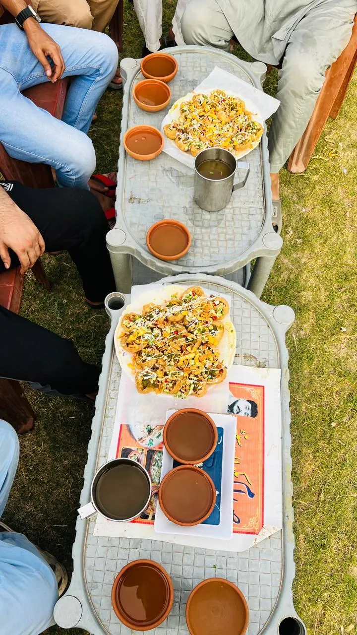 Dev Entity team dinner table during an office outing